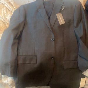 Grey Michael Kors 3 piece suit.  Includes suit coat vest and pants.